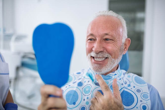 Patient with dental imlants