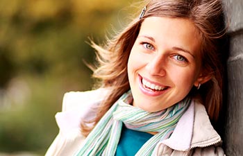 Closeup portrait of a happy young woman smiling